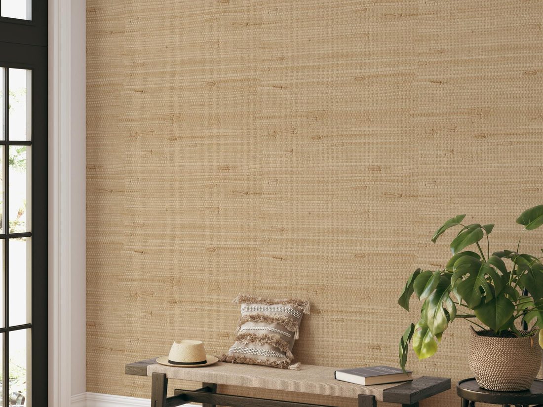 Fine textured grasscloth wallpaper detail in a natural warm tone